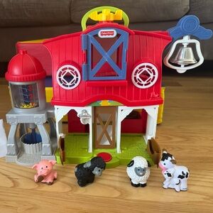Fisher-Price Little People Red and Blue Farmhouse Playset with 4 farm animals.